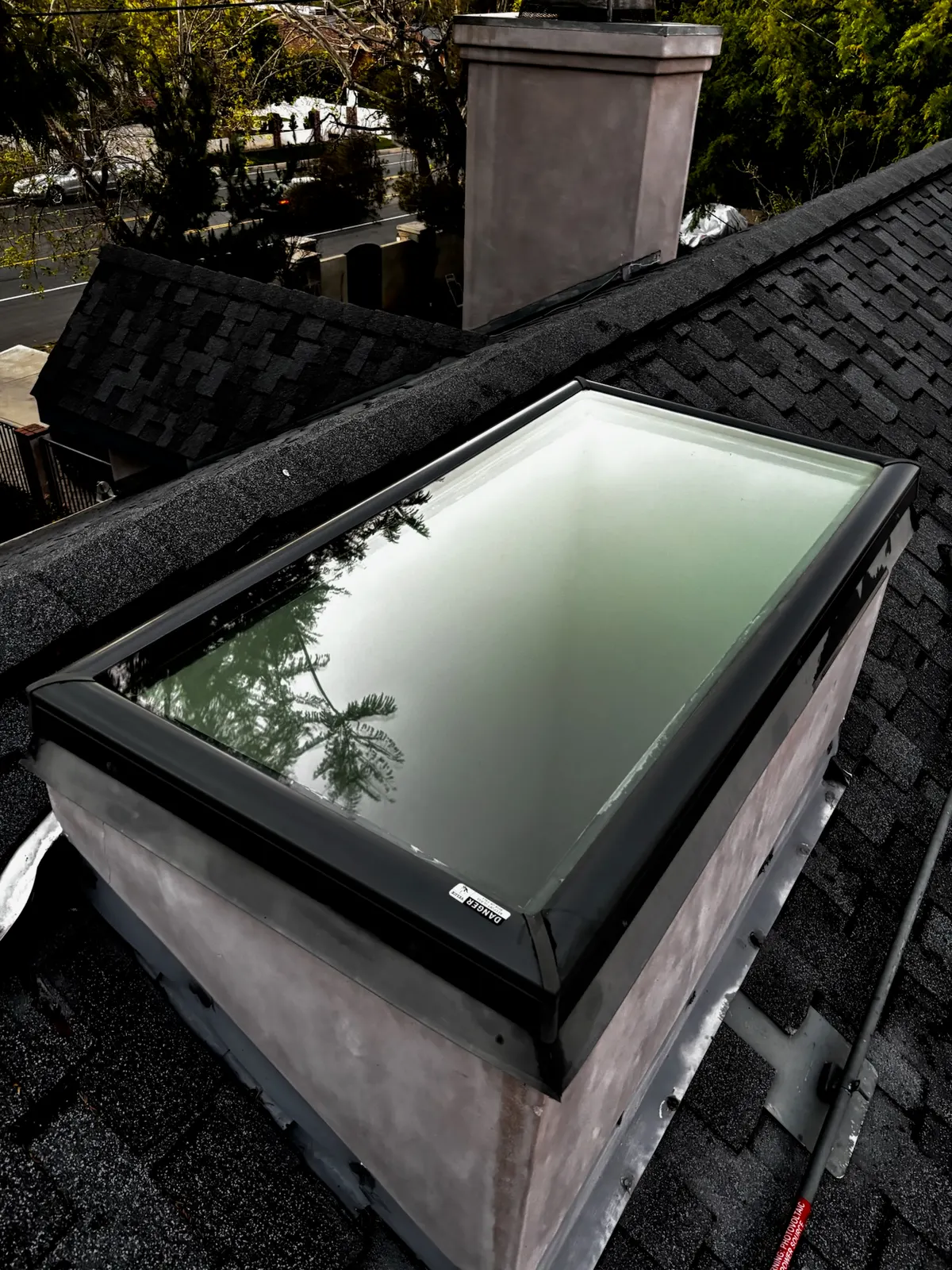 A rooftop skylight cleaned to a clear, streak-free finish