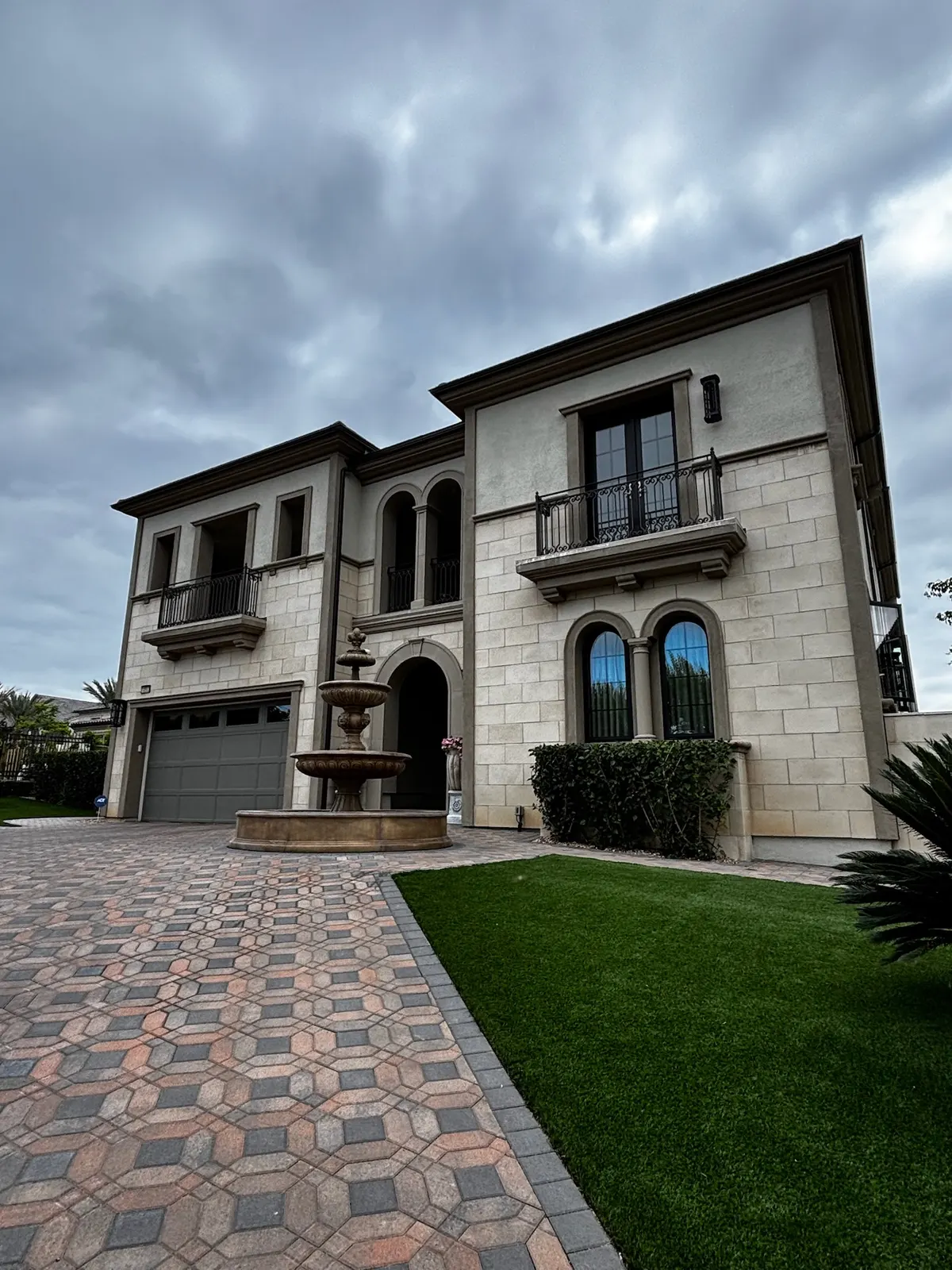 A Mediterranean-style Westside estate with spotless arched windows