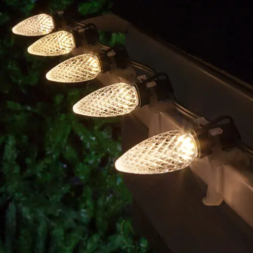 Warm White lights installed along a roofline