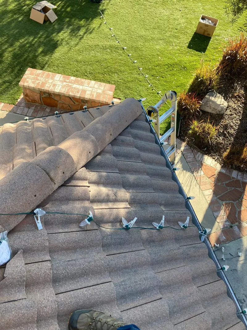 Christmas light clips custom-cut and fitted along a roofline