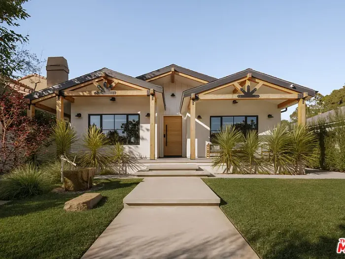 A home photographed in daylight, the starting point for a Halloween lighting design